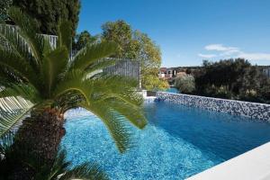 Bazén v ubytování Exklusive Villa mit privatem Pool 50 Meter zum Strand nebo v jeho okolí