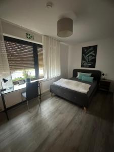 Postel nebo postele na pokoji v ubytování Hotel Hegemann garni