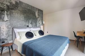 Posteľ alebo postele v izbe v ubytovaní Luxusvilla in Pula mit privatem Pool, Tischtennis, BBQ, WLAN