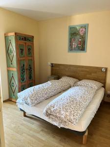 מיטה או מיטות בחדר ב-Maison de 7 chambres avec balcon amenage et wifi a Rorschwihr