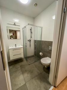 Ein Badezimmer in der Unterkunft Apartment by Park Biznesowy