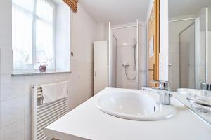 Ένα μπάνιο στο Ferienhaus Achtern Feeld