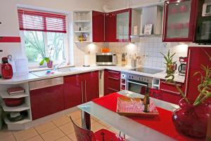 Kuchyň nebo kuchyňský kout v ubytování Apartments Kirsebek