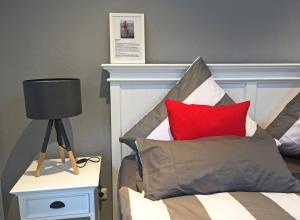 Ένα ή περισσότερα κρεβάτια σε δωμάτιο στο Ferienhaus Kleiner Onkel