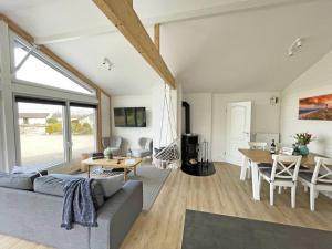 a living room with a couch and a table at Schlei-Idyll in Kappeln