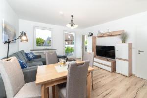 TV a/nebo společenská místnost v ubytování Möwe5