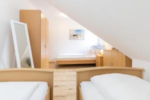 Postel nebo postele na pokoji v ubytování Möwe5