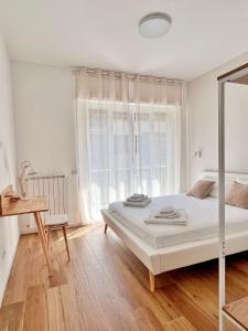 Postel nebo postele na pokoji v ubytování Finella Charming Rooms