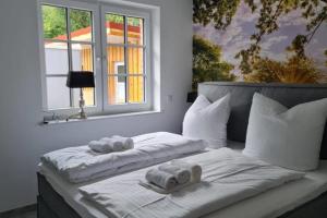 Postelja oz. postelje v sobi nastanitve Mьhlenblick 1 - Luxuswohnung im Luftkurort Hage