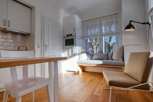 Η κουζίνα ή μικρή κουζίνα στο Landhaus am Ufer - Wohnung 1