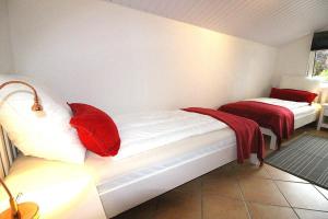 Ένα ή περισσότερα κρεβάτια σε δωμάτιο στο Apartmentvermittlung Mehr als Meer - Objekt 56