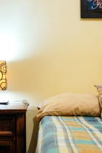 מיטה או מיטות בחדר ב-Mejor precio ubicación 2p habitación cómoda