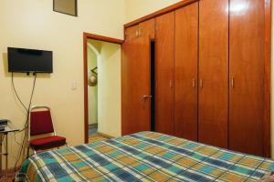 מיטה או מיטות בחדר ב-Mejor precio ubicación 2p habitación cómoda