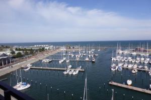 a marina filled with lots of boats in the water at Ferienwohnung Sprotte in Damp