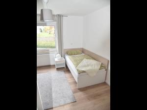 Postel nebo postele na pokoji v ubytování NEU! Ferienhaus Schaaf