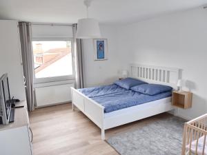 Postel nebo postele na pokoji v ubytování NEU! Ferienhaus Schaaf