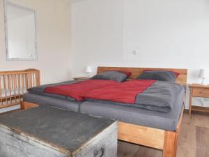 Postel nebo postele na pokoji v ubytování NEU! Ferienhaus Schaaf