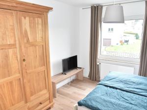 Postel nebo postele na pokoji v ubytování NEU! Ferienhaus Schaaf