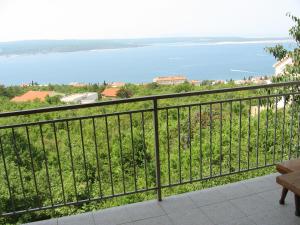 a view of the ocean from a balcony at Apartments Sopaljska 24a in Crikvenica