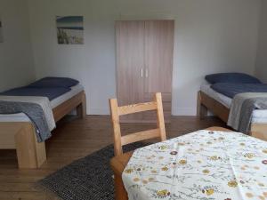 Ένα ή περισσότερα κρεβάτια σε δωμάτιο στο NEU! Ferienwohnung Maja