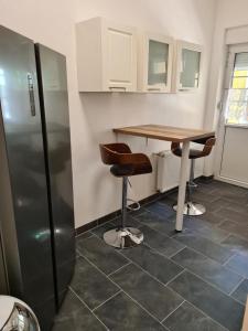 Kuchyň nebo kuchyňský kout v ubytování NEU! Ferienwohnung in Mücheln mit Balkon + 12 fotografií