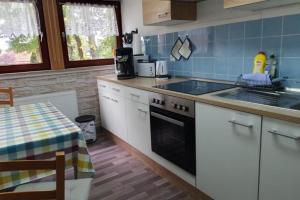 Kuchyň nebo kuchyňský kout v ubytování NEU! Ferienwohnung Ramke OG