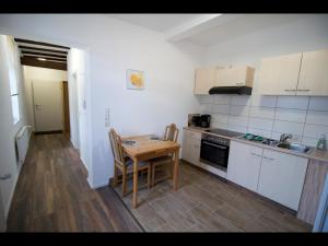 Η κουζίνα ή μικρή κουζίνα στο NEU! Schicke FeWo Alsfeld +6 φωτογραφίες