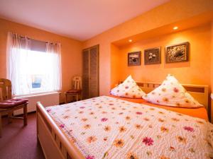 Postel nebo postele na pokoji v ubytování NEU! Komfort Ferienwohnung Himmelsblick Fehmarn