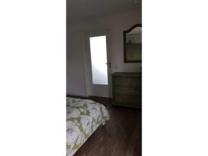 Postel nebo postele na pokoji v ubytování Ferienhaus Fahrrinne 44