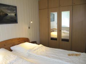 Postel nebo postele na pokoji v ubytování Bungalow Friese 700 Meter vom Strand
