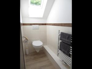Koupelna v ubytování NEU! Landhaus Lüttje Nüst + 26 fotografií