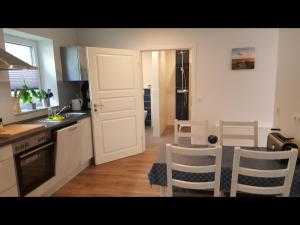 Η κουζίνα ή μικρή κουζίνα στο NEU! Ferienwohnung Amrum +14 φωτογραφίες