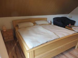Postel nebo postele na pokoji v ubytování Ferienwohnung Aurich Ostfriesland