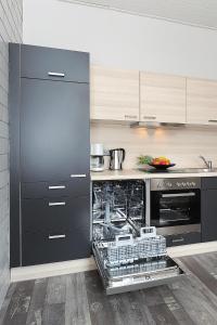 Kuchyň nebo kuchyňský kout v ubytování NEU! Ferienhaus Nordseewind