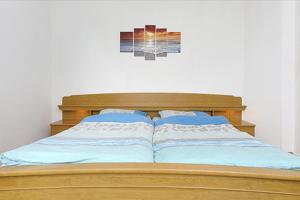 Postel nebo postele na pokoji v ubytování NEU! Ferienhaus Nordseewind