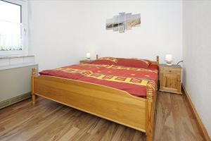 Postel nebo postele na pokoji v ubytování NEU! Ferienhaus Nordseewind
