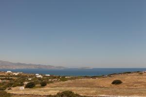 a view of the ocean from the top of a hill at Ergina Summer Resort in Antiparos