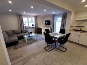 Fotografie z fotogalerie ubytování NEU Ferienhaus Musenburg Apartment W2 v destinaci Stedesand