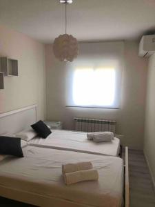 Postel nebo postele na pokoji v ubytování El Encinar de Carol + 91 fotografií