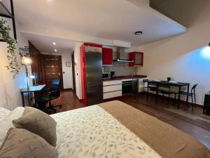 Η κουζίνα ή μικρή κουζίνα στο Central Suites Arenal +18 φωτογραφίες