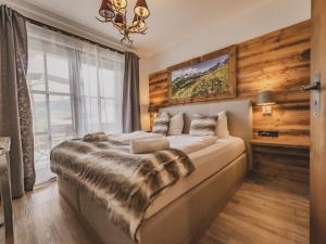 Łóżko lub łóżka w pokoju w obiekcie Green Garden Lodge B1