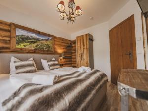 Łóżko lub łóżka w pokoju w obiekcie Green Garden Lodge B1