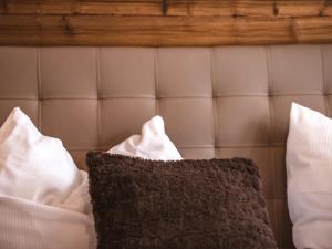 Łóżko lub łóżka w pokoju w obiekcie Green Garden Lodge B1