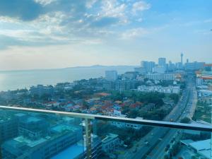 arial view of a city with a bridge over a highway at dusit grand condo view高层海景房 in Jomtien Beach