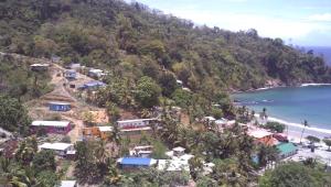 a small village on a hill next to the ocean at Maracas Bay View in Maracas Bay Village