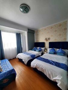Ένα ή περισσότερα κρεβάτια σε δωμάτιο στο Kaias Transient & Condotels - 530 Albergo