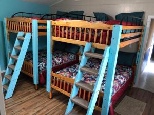 a couple of bunk beds in a room at Fishers Of Men Ranch Home in Marble Falls