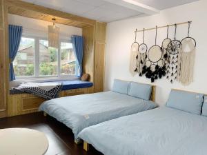 Кровать или кровати в номере Belle House Đà Lạt
