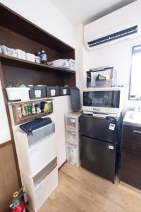 Cucina o angolo cottura di 恐竜博物館まで車で5分 自然体験 古来農業体験ができる一棟貸し宿Dinosaur Agri