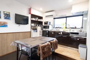 Cucina o angolo cottura di 恐竜博物館まで車で5分 自然体験 古来農業体験ができる一棟貸し宿Dinosaur Agri